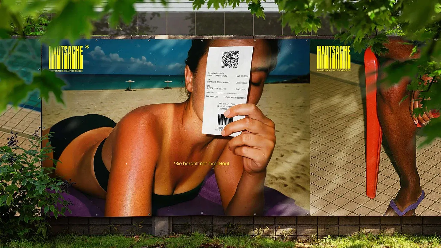 Young woman lying in direct sunlight and holding her smartphone in front of her face.