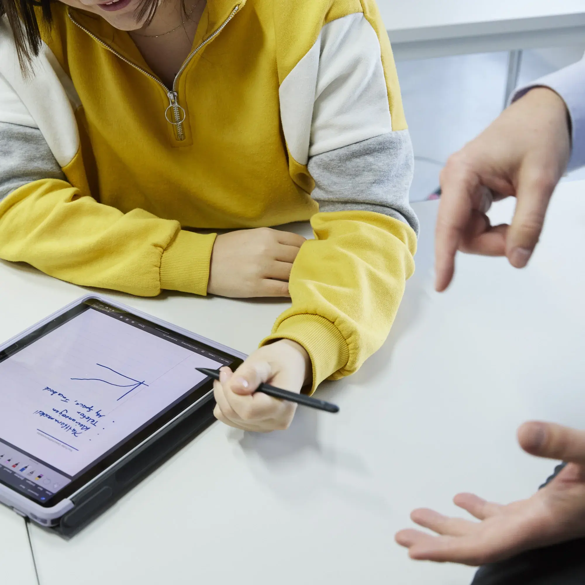 A student is working on a laptop.